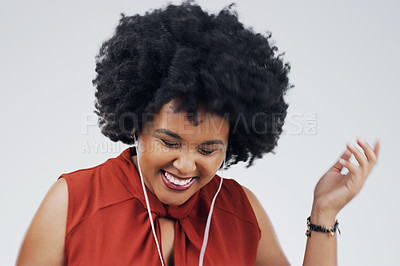 Buy stock photo Laughing, dance or happy black woman in music headphones in studio for singing on grey background. Model, funny podcast or African person listening to radio playlist, sound or comedy audio with smile