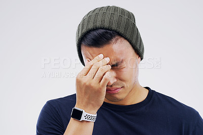 Buy stock photo Man, headache and pain in studio, stress and burnout or anxiety for mental health on gray background. Male person, worry and sad for fail or mistake, migraine and distress on mockup space or upset