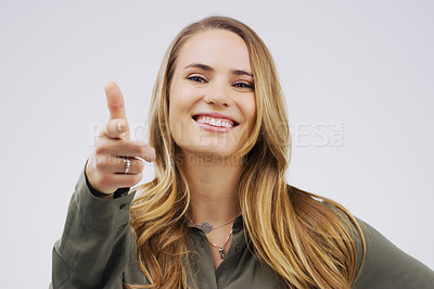 Buy stock photo Portrait, happy and woman with finger gun in studio for gesture or sign to agree, opinion and choice from cheerful expression. Smile, female person and point with hand for show on support for vote 