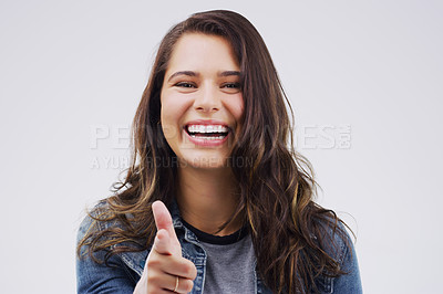 Buy stock photo Portrait, happy and woman with finger gun in studio for gesture or sign to agree, opinion and choice from cheerful expression. Smile, female person and point with pride for show on support for vote 