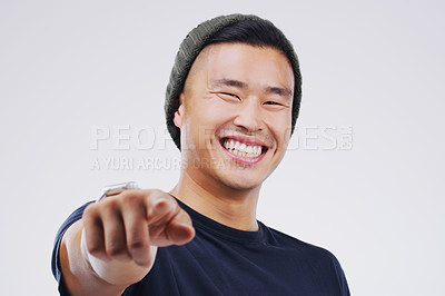 Buy stock photo Portrait, smile and Asian man pointing at you for choice, decision and face in studio isolated on a white background space. Direction, selection and hand gesture for opportunity, support or hiring