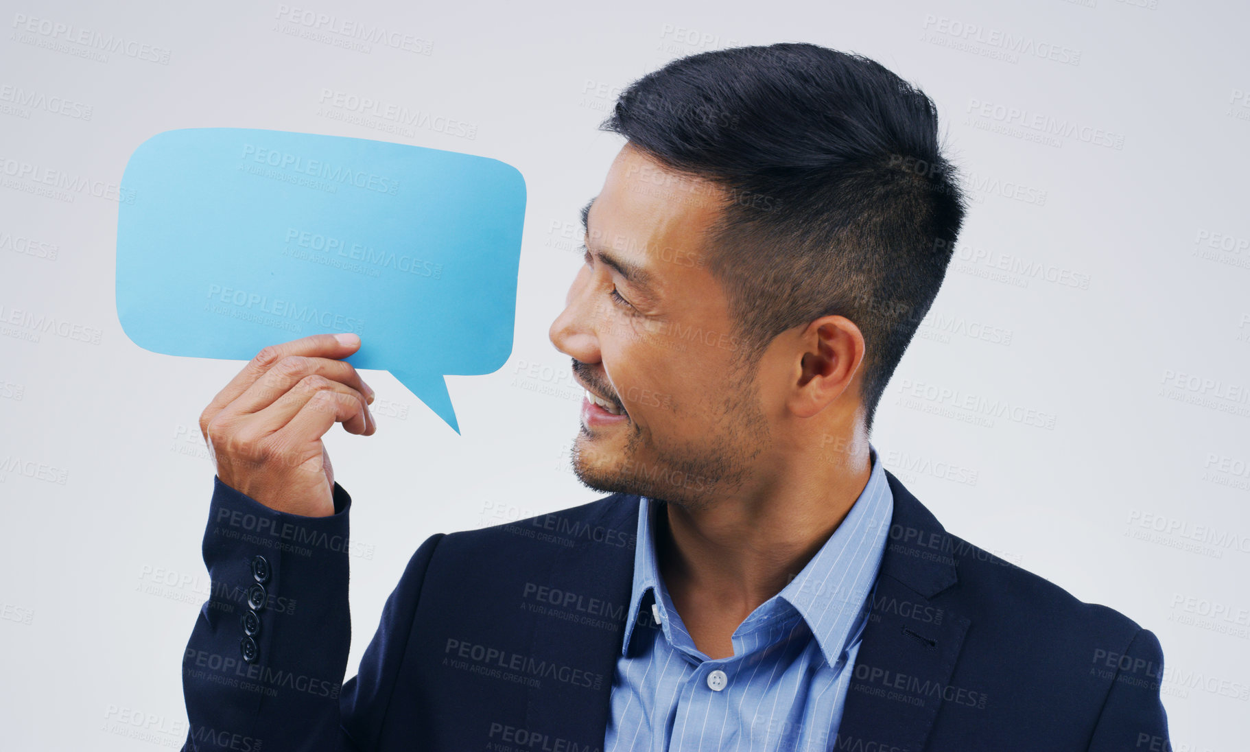 Buy stock photo Asian business man, speech bubble and studio with smile, opinion or social media with by background. Businessman, poster or paper sign for vote, review or mockup with happiness for idea, news or chat