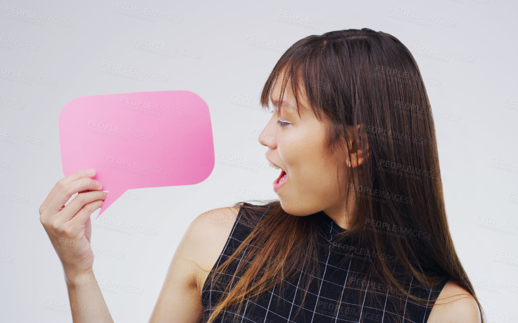 Buy stock photo Surprised, woman with speech bubble and against a white background. Communication or conversation, social media or announcement and person with wow or shock reaction in a studio with voice opinion