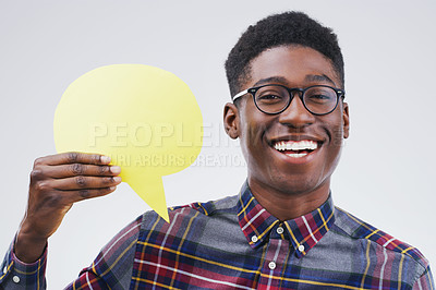 Buy stock photo Happy black man, portrait and speech bubble for social media, question or FAQ against a white studio background. Excited African male person with smile or sign in comment, message or mockup space