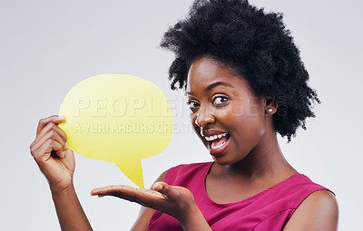 Buy stock photo Happy black woman, portrait and speech bubble for social media, surprise or question against a white studio background. African female person with afro or sign for comment or FAQ on mockup space