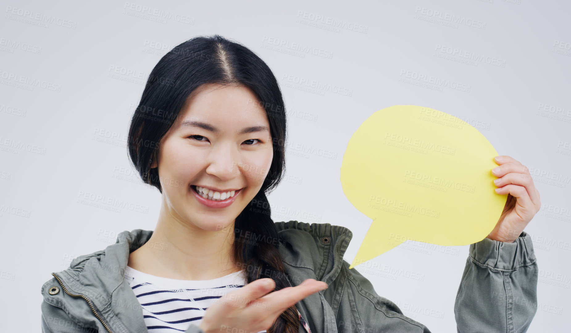 Buy stock photo Happy asian woman, portrait smile and speech bubble for question, FAQ or social media against a white studio background. Excited female person smiling with sign for comment, message or mockup space