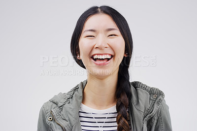 Buy stock photo Female youth, laugh and face with happiness with studio  with freedom and positivity. Woman, student and funny with portrait, free with cheerful mood with smile in casual clothes.