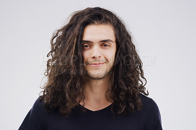 Buy stock photo Man, portrait and curly in studio for haircare, style and positive on gray background. Happy male person, face and confident for beauty or cosmetics, mockup space and texture for treatment