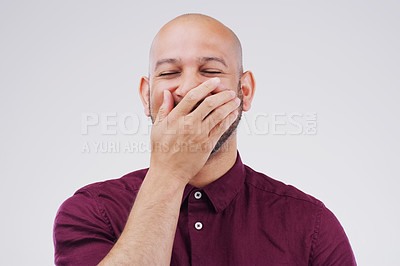 Buy stock photo Man, cover mouth and laugh in studio for funny joke, comic and silly on gray background. Male person, happy and goofy comedy or mockup space for humor, positive and hand for satisfaction or wellness