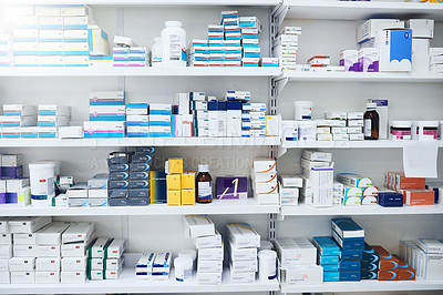 Buy stock photo Shot of shelves stocked with various medicinal products in a pharmacy
