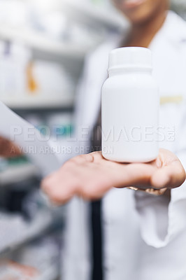 Buy stock photo Cropped shot of a female pharmacist recommending medication