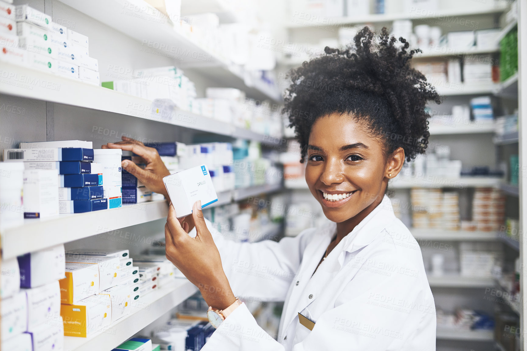 Buy stock photo Portrait, black woman and pharmacist with product in clinic for medicine stock, reading and check information on label. Smile, female person and pills box for medical inventory, inspection and retail