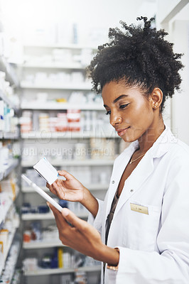 Buy stock photo Black woman, tablet and pharmacist reading medicine label for stock take or check inventory with box. Tech, pharmacy and medical worker with drugs for online prescription, information or telehealth