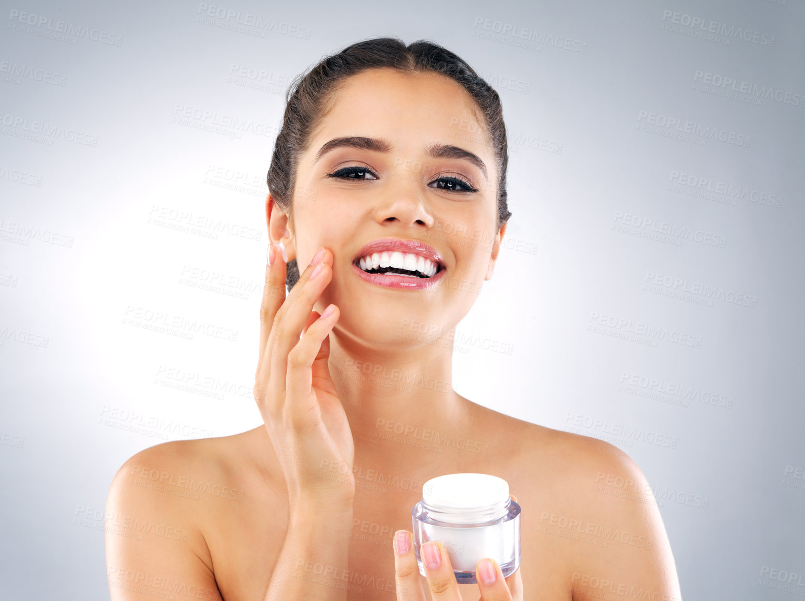Buy stock photo Studio, face cream and jar with girl in portrait for skincare, hydration or beauty with cosmetics. Female model, lotion or moisturizer by white background for wellness shine, facial treatment or glow