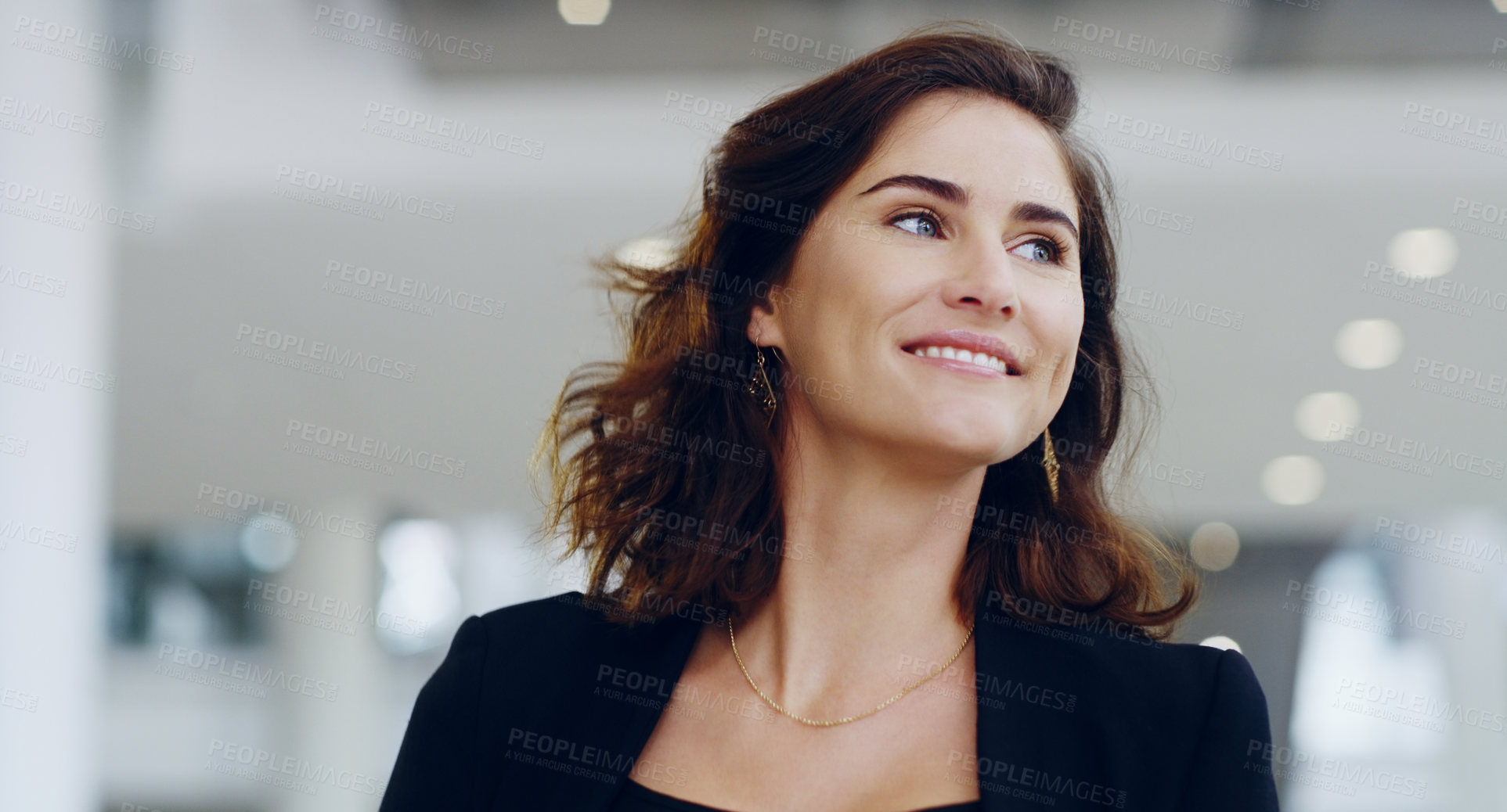 Buy stock photo Cropped shot of a confident young businesswoman working in a modern office