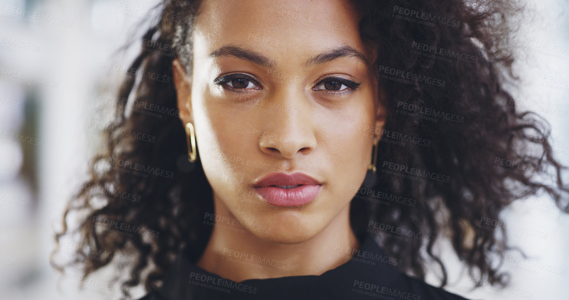 Buy stock photo Cropped shot of an attractive young businesswoman standing in her workplace