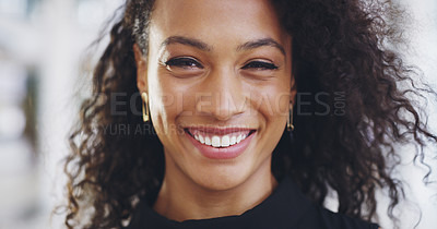 Buy stock photo Cropped shot of an attractive young businesswoman standing in her workplace
