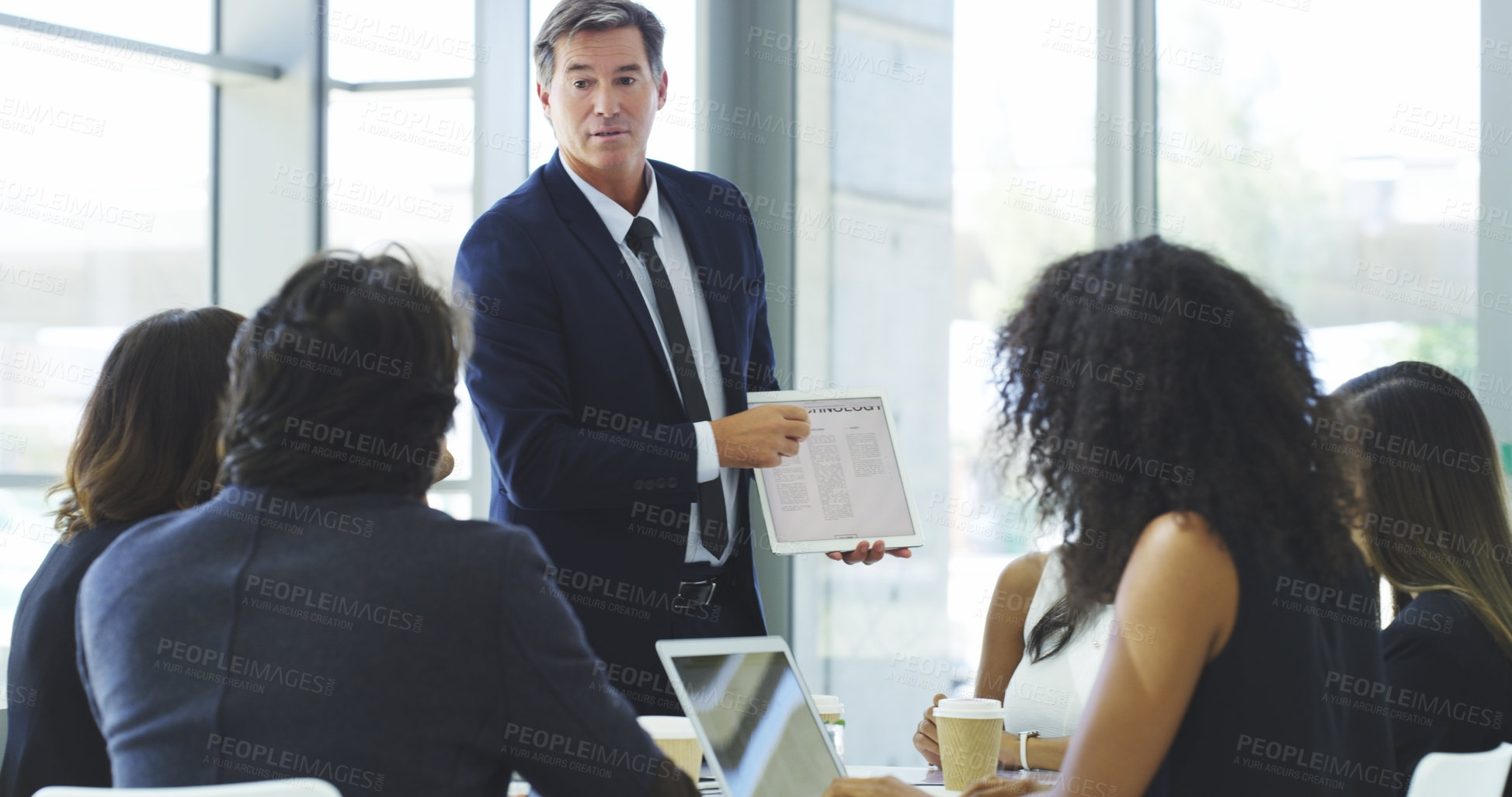 Buy stock photo Coaching, presentation and tablet with business people in boardroom of office together for feedback. Information, training and technology with man employee talking to investors in workplace for intro