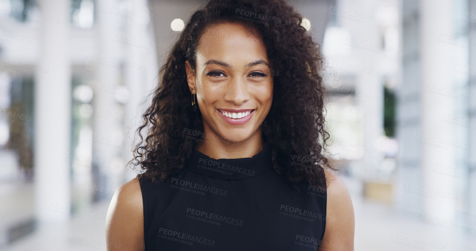 Buy stock photo Cropped shot of a confident young businesswoman working in a modern office