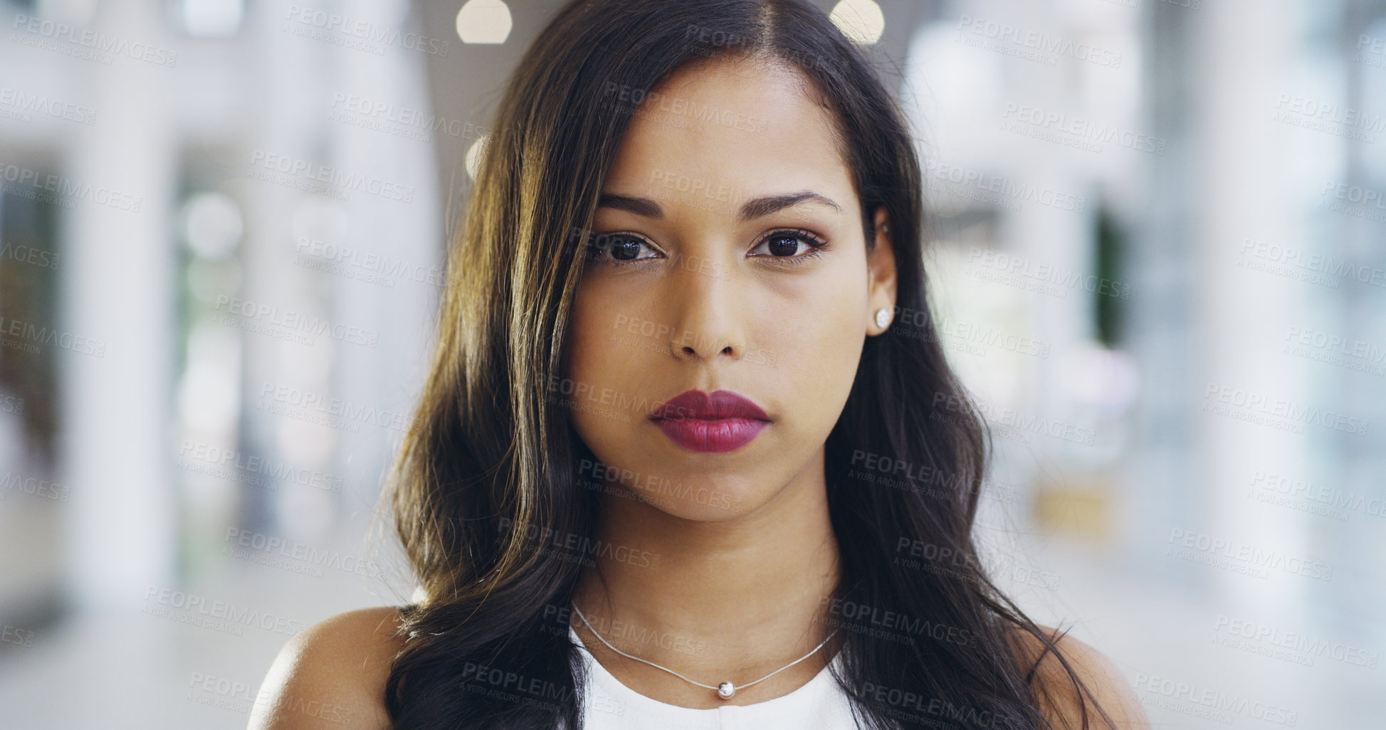 Buy stock photo Cropped shot of a young beautiful businesswoman in a modern office