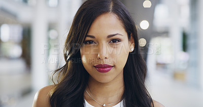 Buy stock photo Cropped shot of a confident young businesswoman working in a modern office