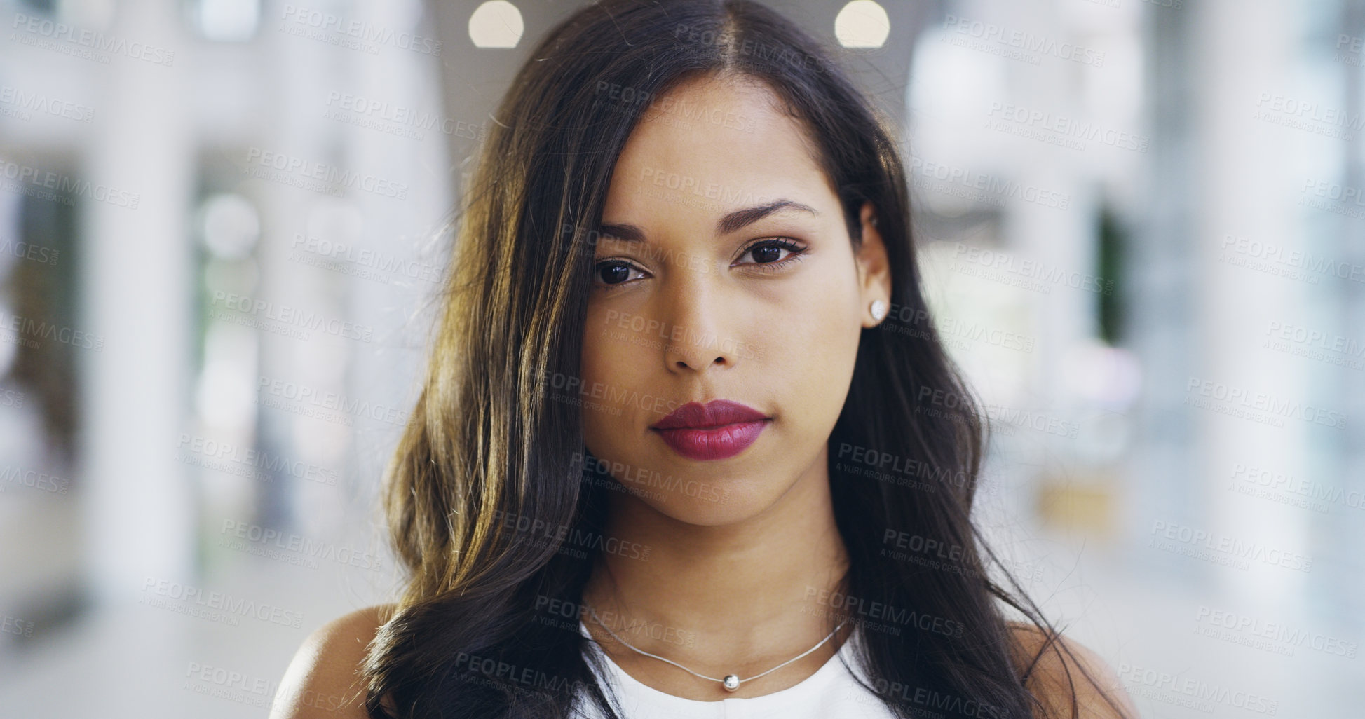 Buy stock photo Cropped shot of a confident young businesswoman working in a modern office