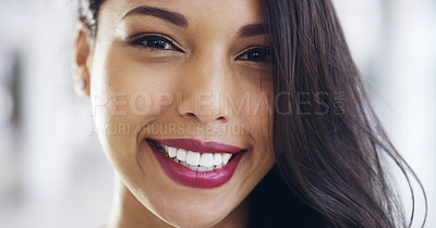 Buy stock photo Cropped shot of a confident young businesswoman working in a modern office