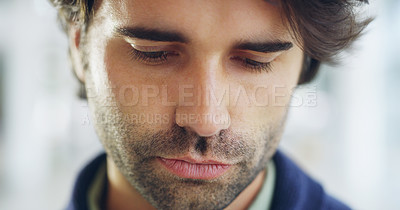 Buy stock photo Cropped shot of a young handsome businessman in a modern office