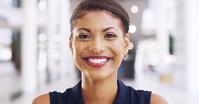 Buy stock photo Cropped shot of a young beautiful businesswoman in a modern office