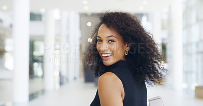 Buy stock photo Cropped shot of a young beautiful businesswoman in a modern office
