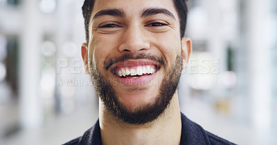 Buy stock photo Cropped shot of a young handsome businessman in a modern office