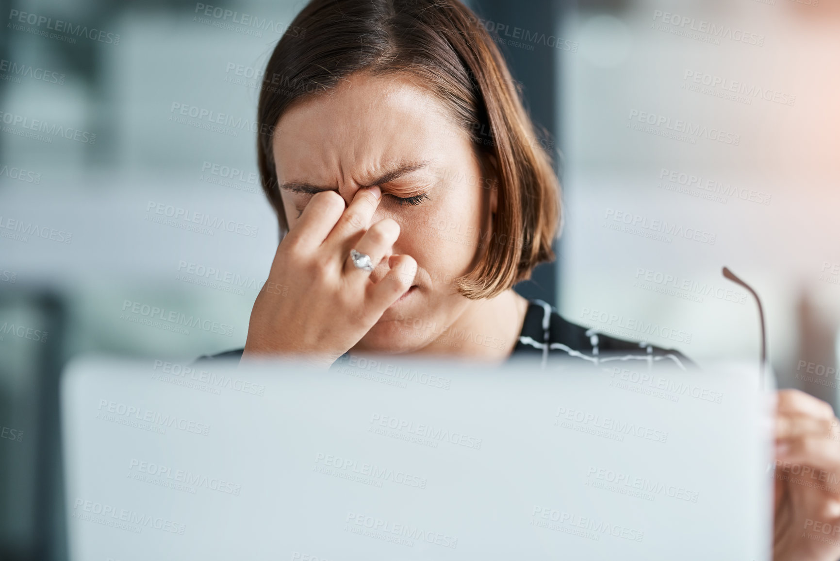 Buy stock photo Business, woman and headache with laptop in office for fatigue, brain fog and anxiety of project mistake. Female person, tired and migraine with eye strain, burnout stress and vertigo for deadline