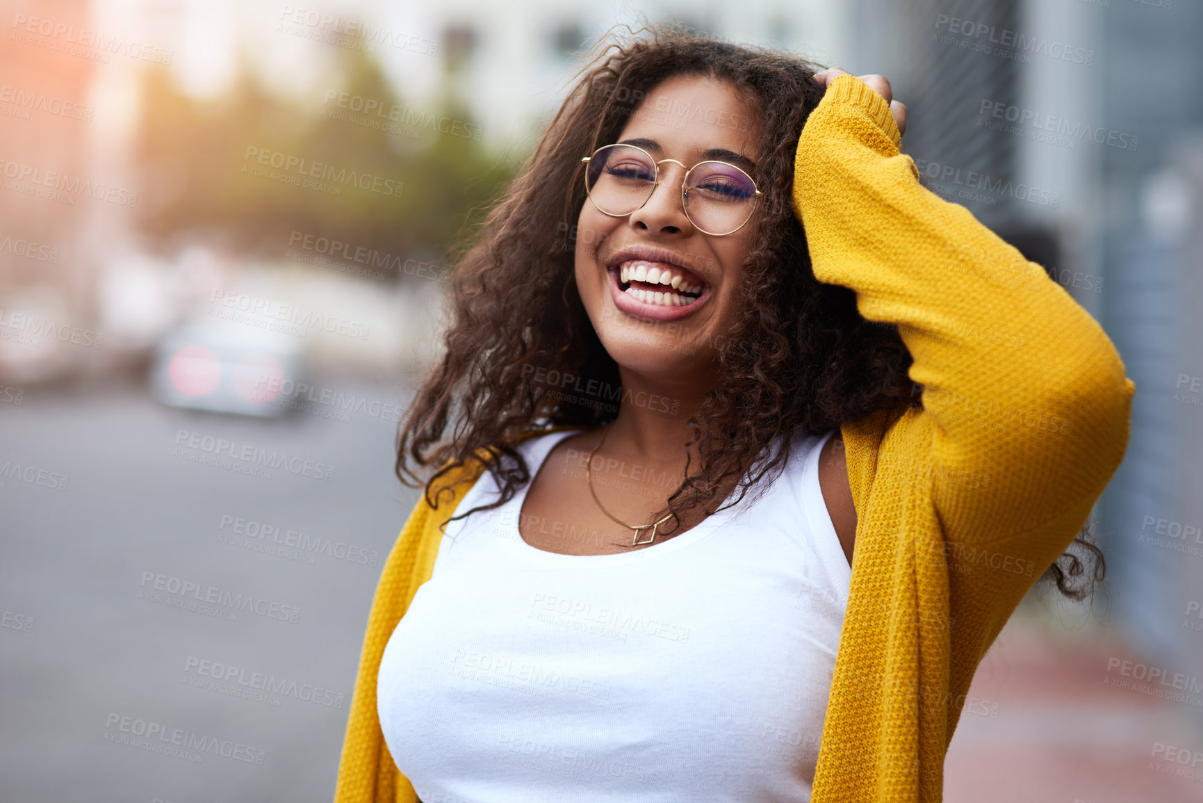 Buy stock photo Portrait, laugh and confident woman in city with glasses for fashion, cool and travel outdoor. Face, funny and African student with spectacles on street for vision, casual clothes and happy in Kenya