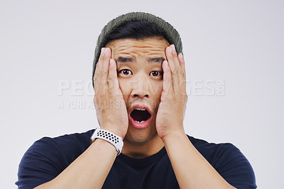 Buy stock photo Asian man, portrait and shock in studio or alarm, gossip and wtf or omg for secret on white background. Male person, surprise and overwhelmed for news or info, worry and panic for rumor or what
