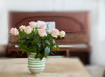 Buy stock photo A beautiful red and pink roses in a vase
