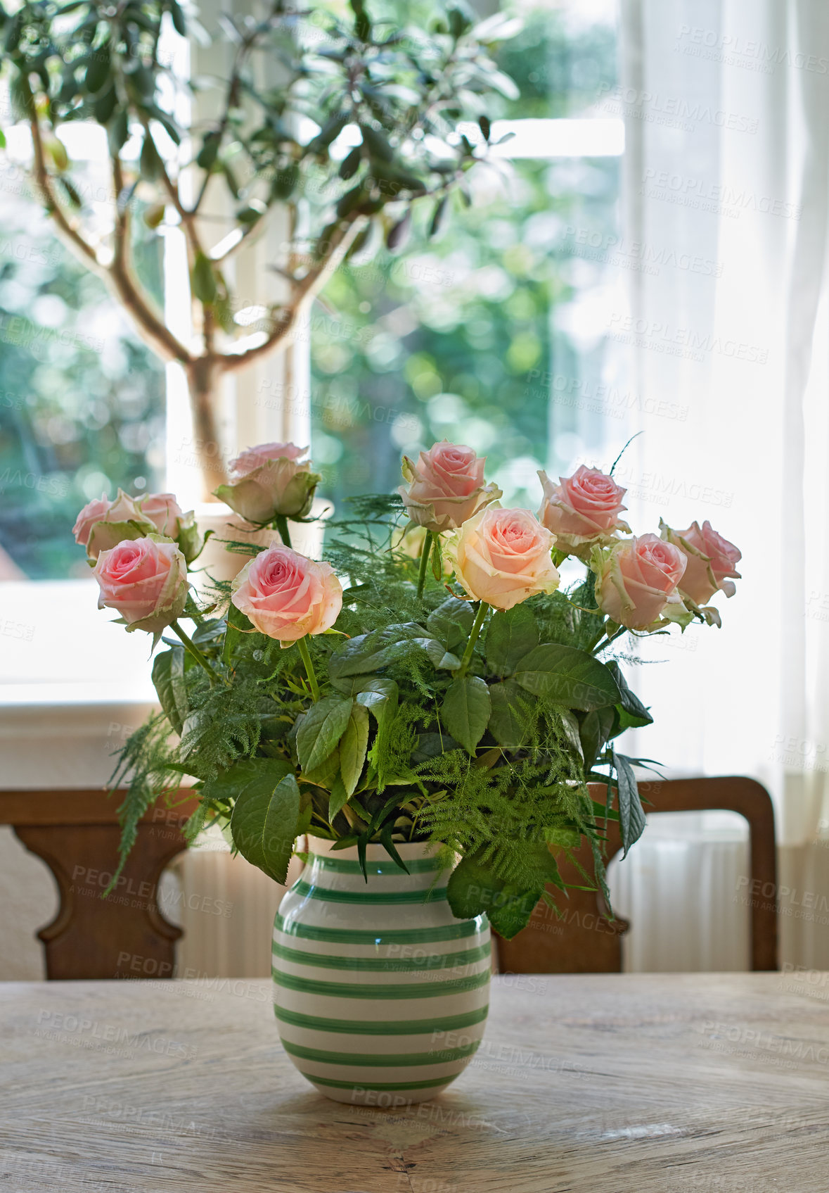 Buy stock photo A beautiful red and pink roses in a vase