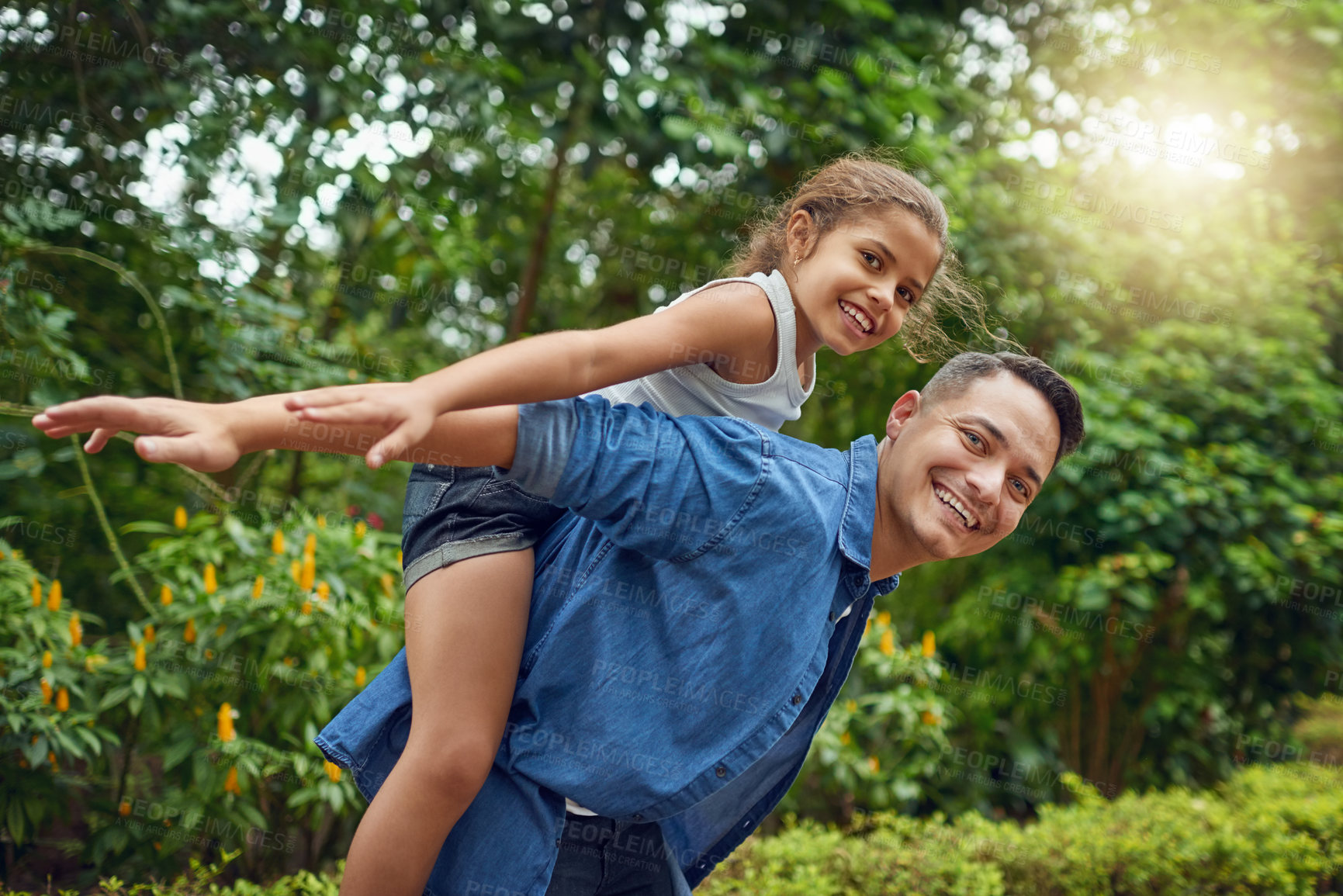 Buy stock photo Father, girl and happy with piggyback in garden at home for bonding, support and playing. People, parent and smile with kid on portrait at park for memories, care and child development or growth