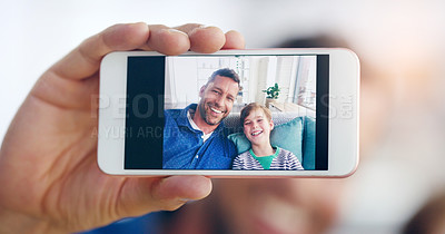 Buy stock photo Happy father, child and smile in selfie, profile picture or social media post relaxing on sofa at home. Dad and kid smiling for photo, memory or online vlog together on living room couch in the house