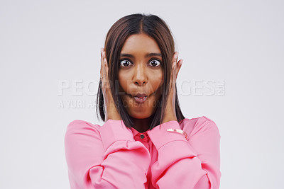 Buy stock photo Portrait, funny face and lips with an indian woman in studio on white background looking silly or goofy. Comedy, comic or crazy with a fun young female person sucking cheeks indoor for playful humor