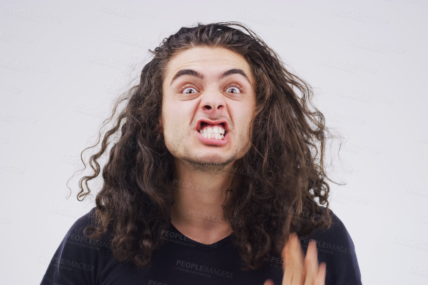 Buy stock photo Man, portrait and crazy in studio, mouth and comic or funny expression on grey background. Comedian, awkward and quirky for comedy with weird angry face, student and humour for goofy character