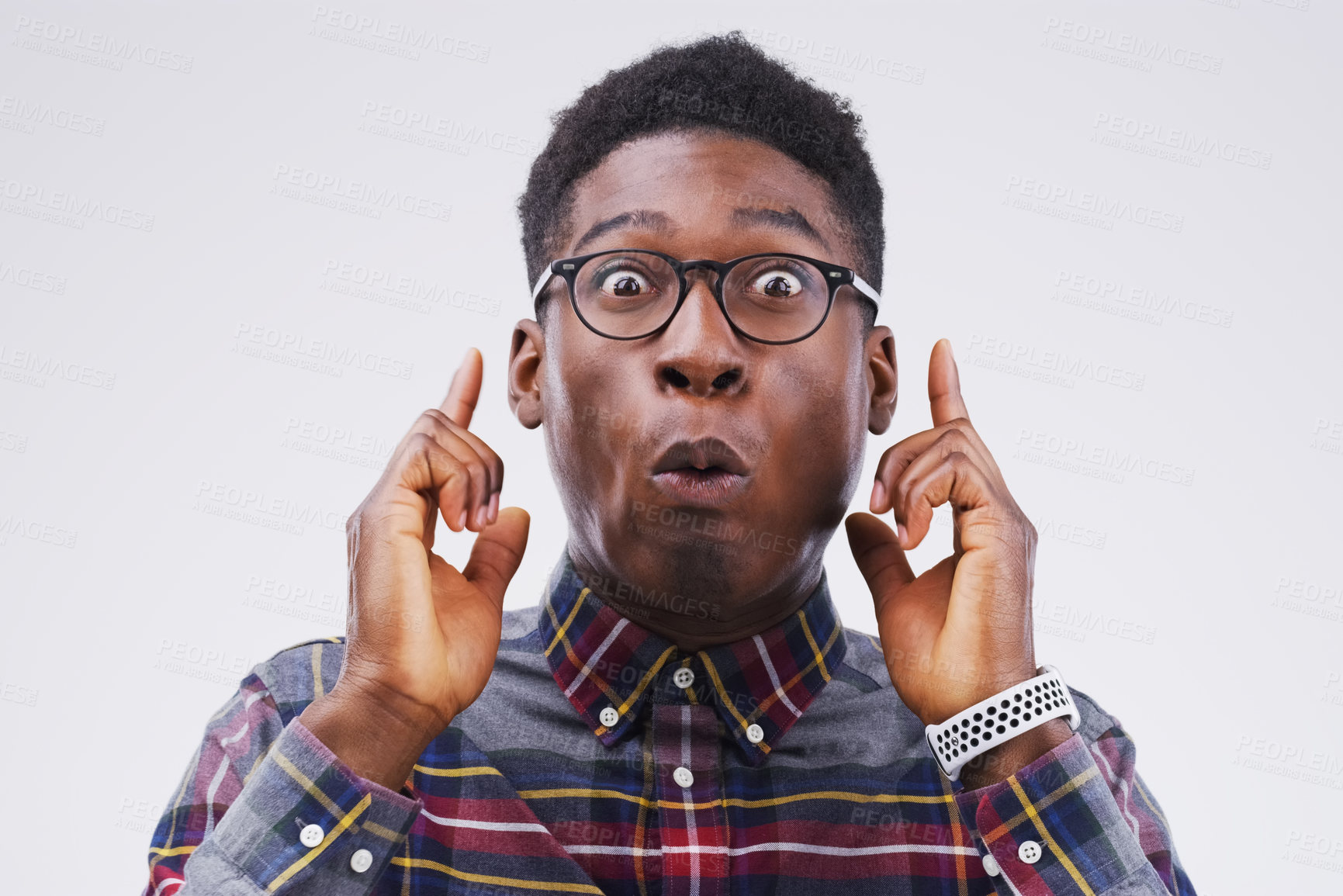 Buy stock photo Black man, funny face and portrait with glasses in studio for playful, comic or excited on white background. Male person, geek or nerd with spectacles isolated in backdrop for humour, goofy or quirky