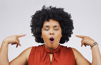 Buy stock photo Woman, studio and pointing to head in casual fashion with eyes closed for idea, thought and crazy hand sign. Mouth open, thinking and female person on white background for fun, memory and comedy