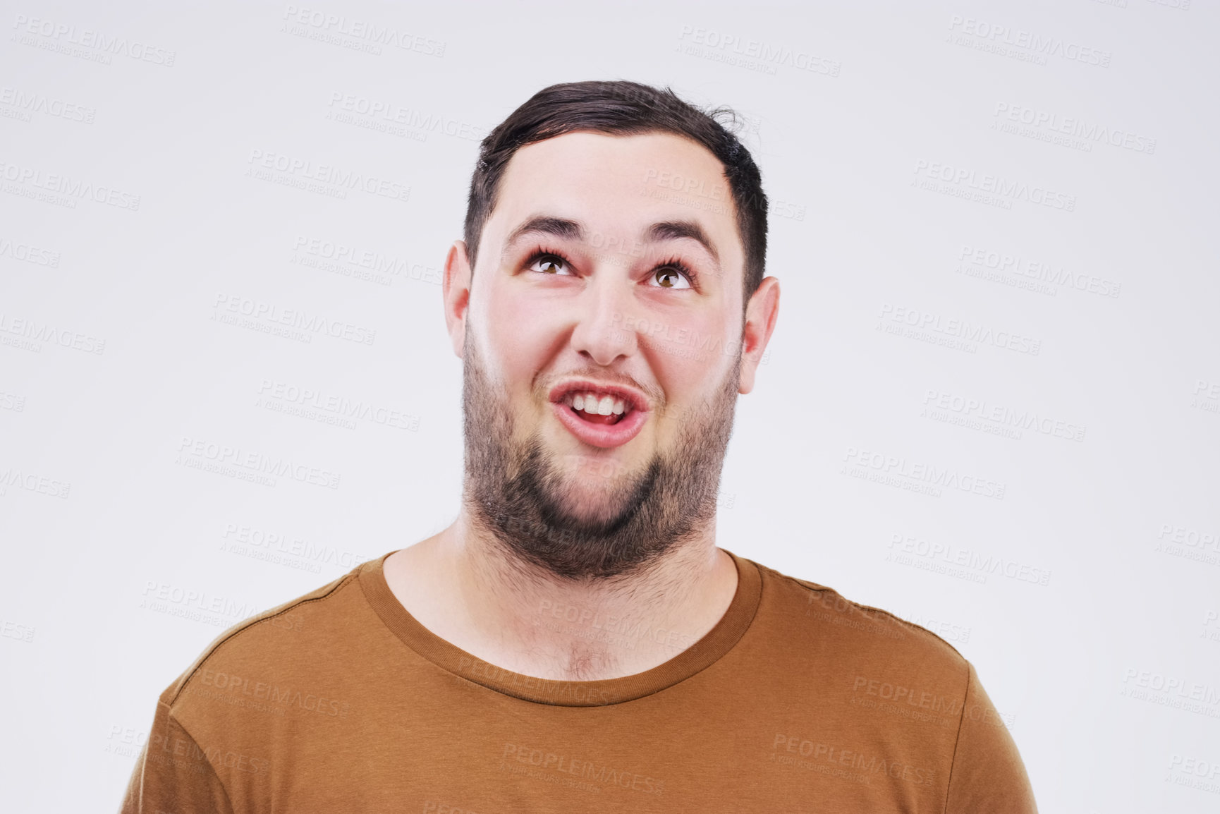 Buy stock photo Man, funny face and open mouth in studio for comic, comedy and crazy or weird expression. Comedian, facial gesture and pout for joke, prank and laugh on isolated gray background with mockup space