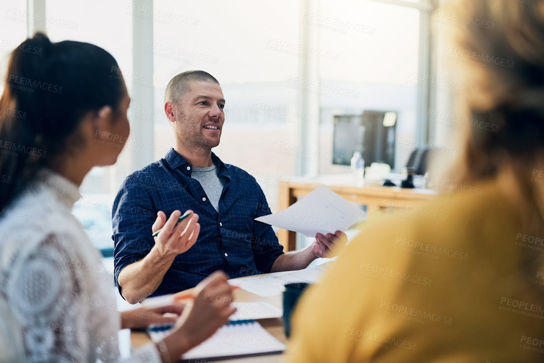 Buy stock photo Man, business people and startup with documents with group, discussion and planning in modern office. Team, paperwork and diversity with conversation, problem solving and meeting at creative agency