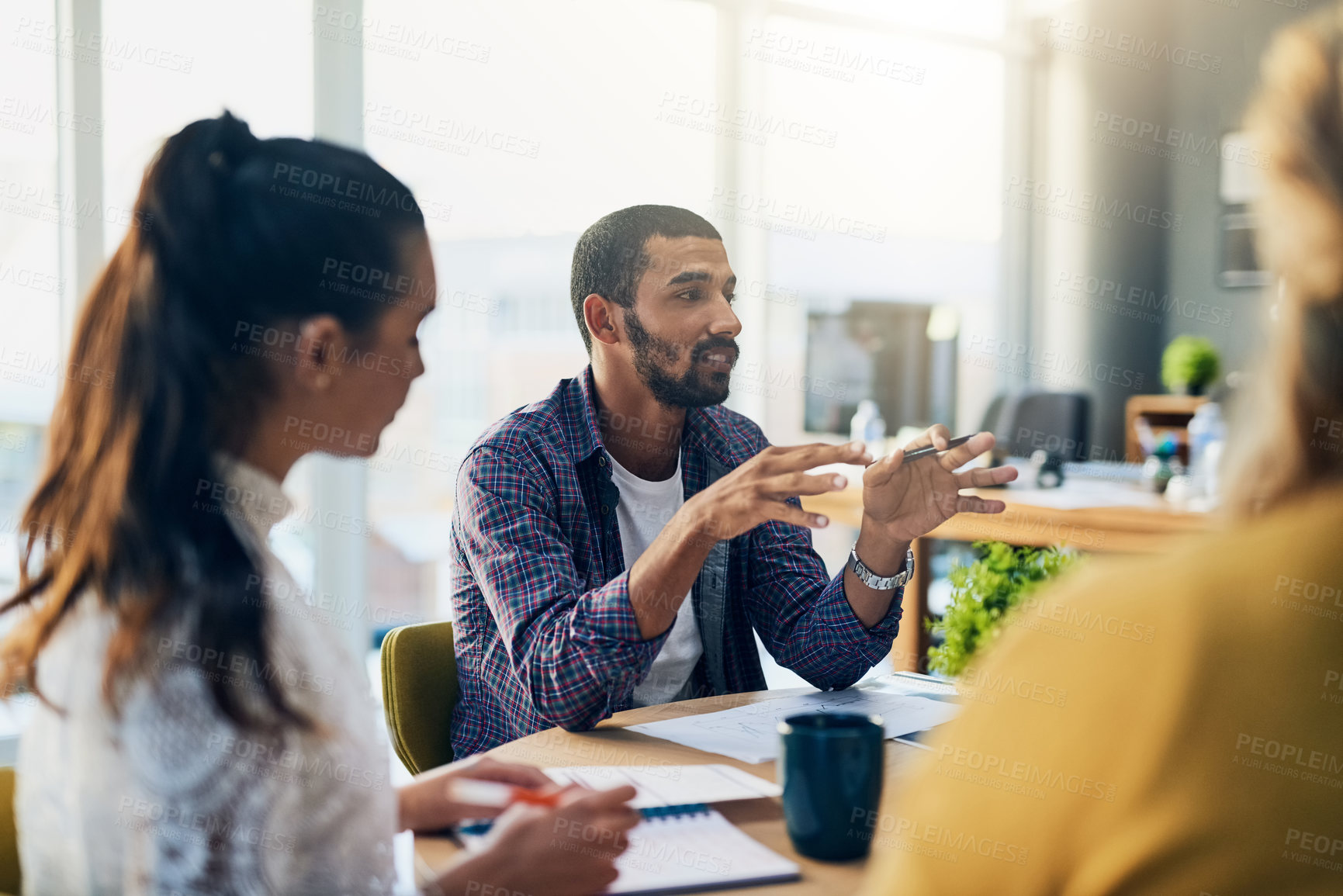 Buy stock photo Man, business people and startup with documents in meeting, discussion and planning in modern office. Teamwork, paperwork and diversity with conversation, problem solving and group at creative agency