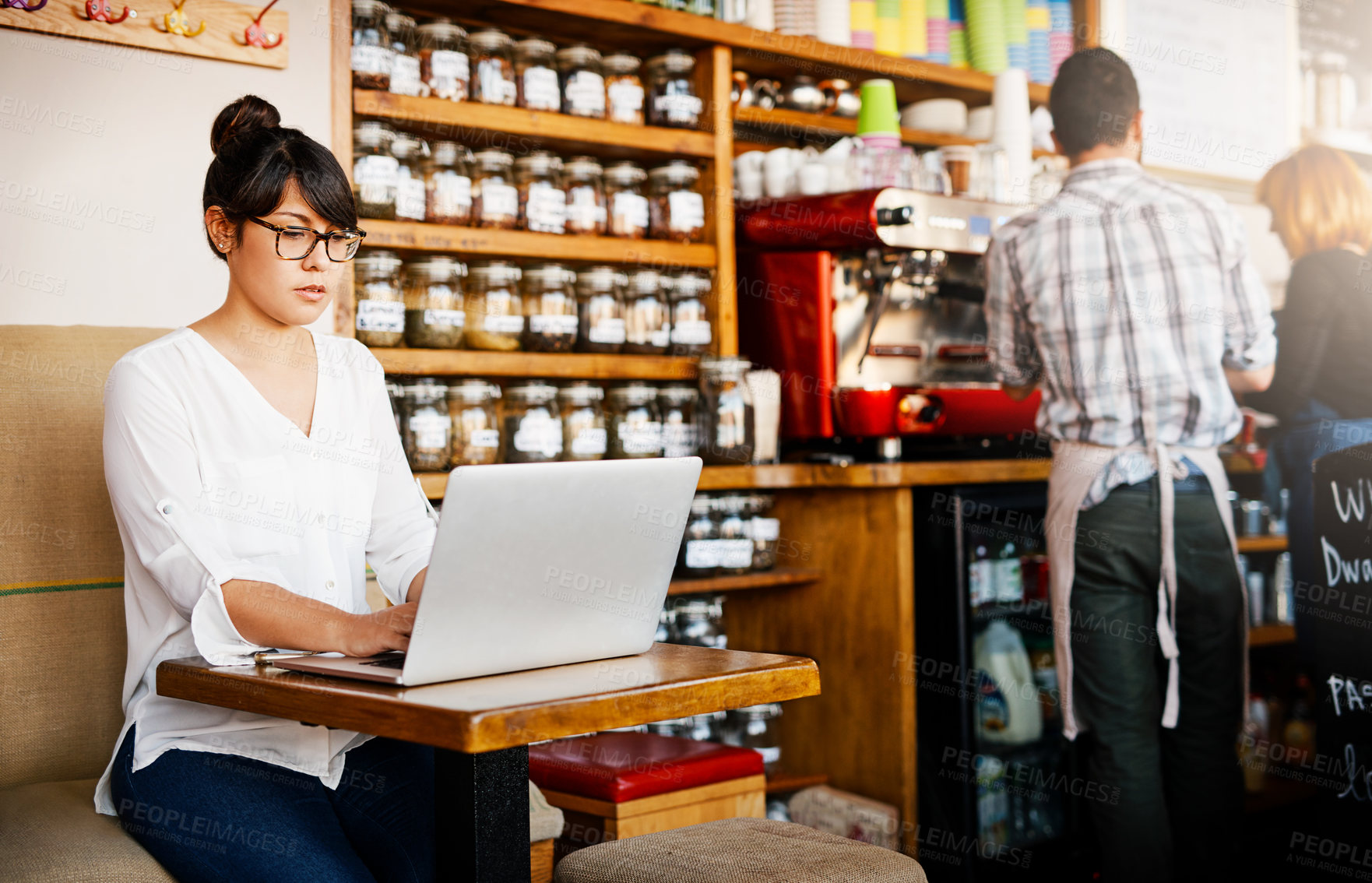 Buy stock photo Woman, coffee shop and laptop for connection in small business as customer for service or order. Female person, typing and working with technology in cafe or bistro as client in hospitality industry