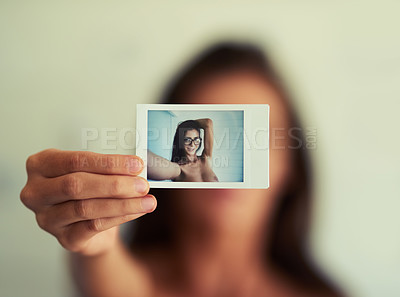 Buy stock photo Shot of an attractive young woman posing nude against a grey background