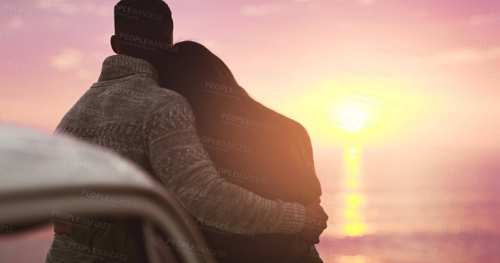 Buy stock photo Couple, hug and sky or sunset at beach on vacation, holiday or adventure. Back of man and woman together for love, road trip and travel journey or date outdoor in nature with mockup space and freedom