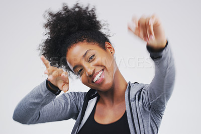 Buy stock photo Dancing, happy and portrait of black woman in studio for celebration, winning prize or promotion on gray background. Movement, excited and female person for satisfaction, good news or stress relief