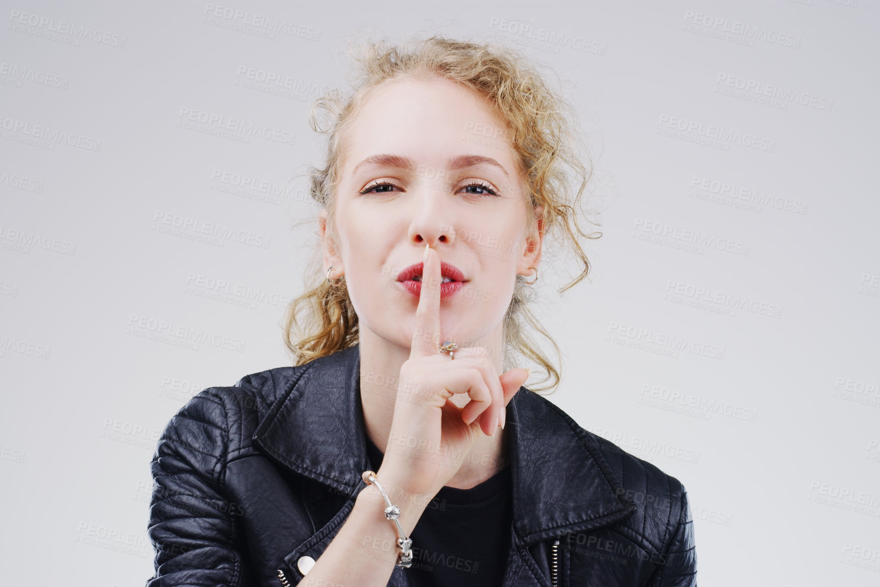 Buy stock photo Woman, portrait and finger with shush, studio and silence for mystery announcement. Model, gossip and secret with rumor, whisper and gesture for news or noise with confidential on white background